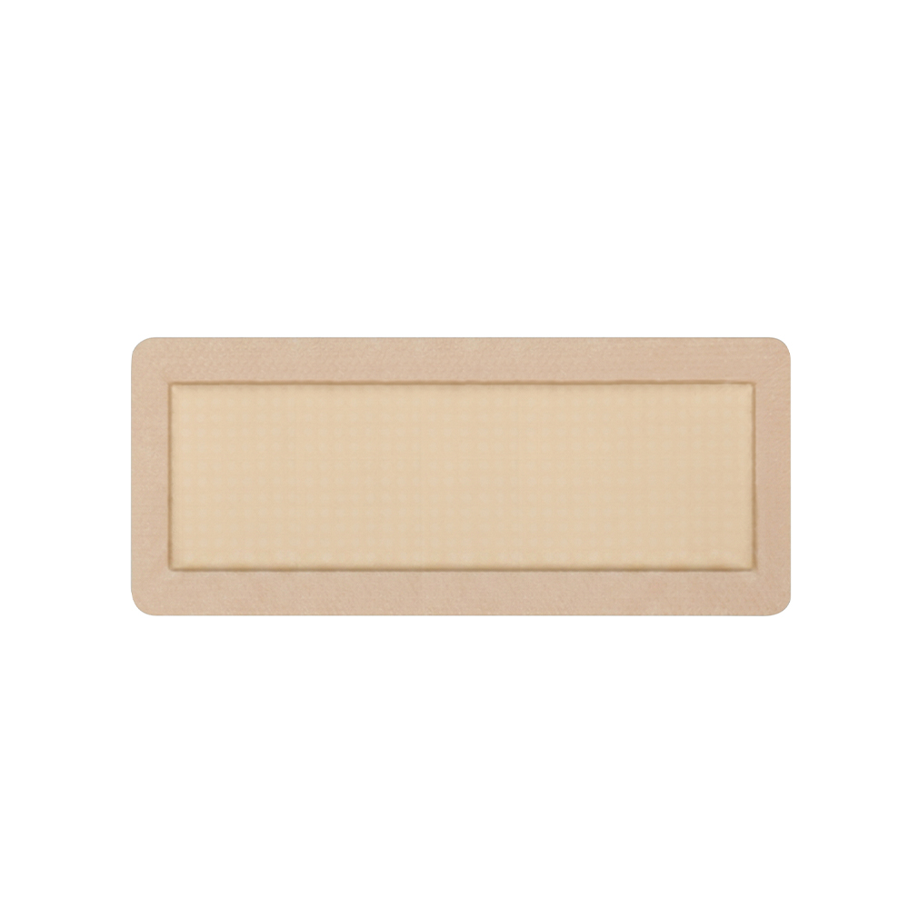 Medicazione in schiuma bordata in silicone rettangolare lunga 30x10 cm
