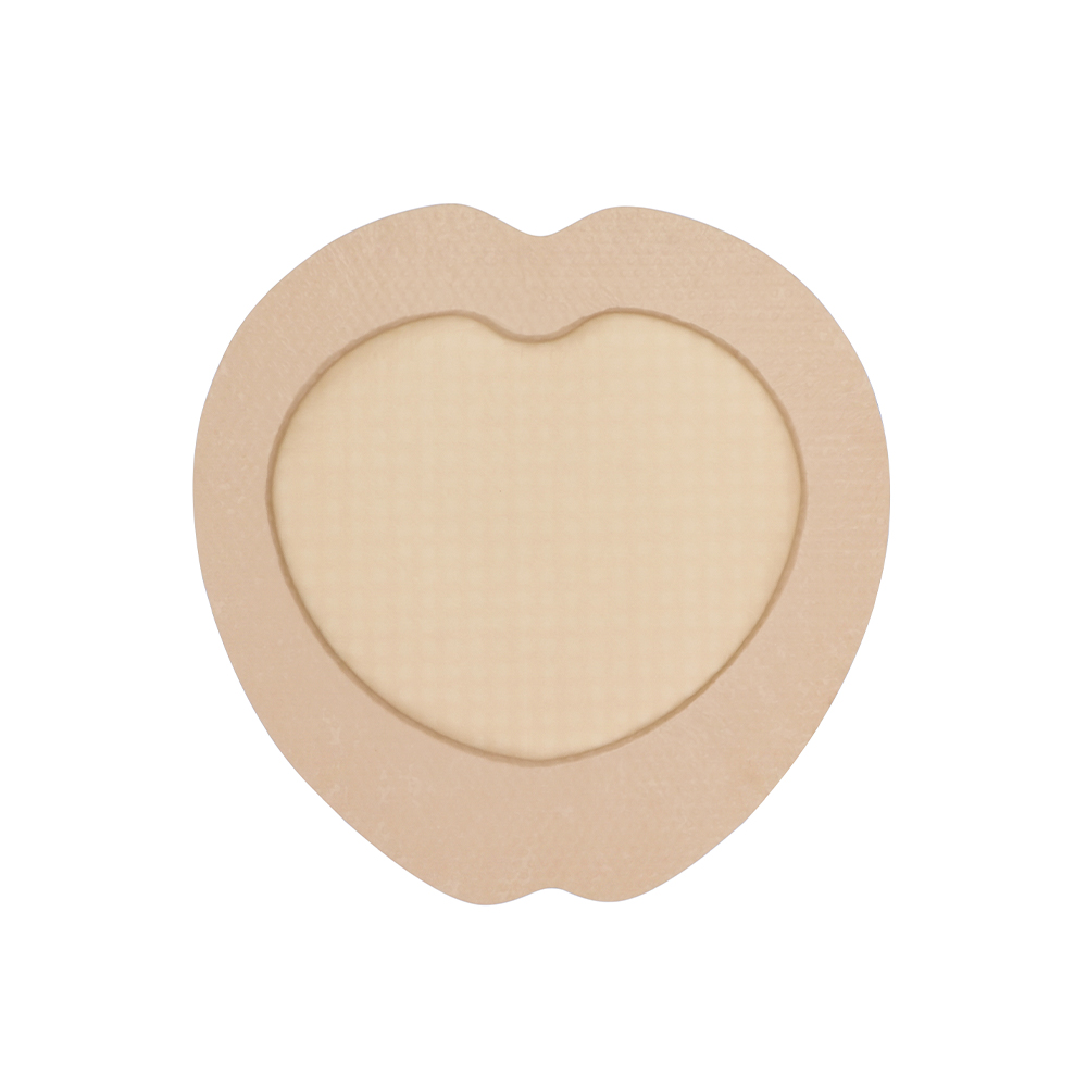 Medicazione in schiuma bordata in silicone sacrale a forma di cuore da 22,5x22,5 cm
